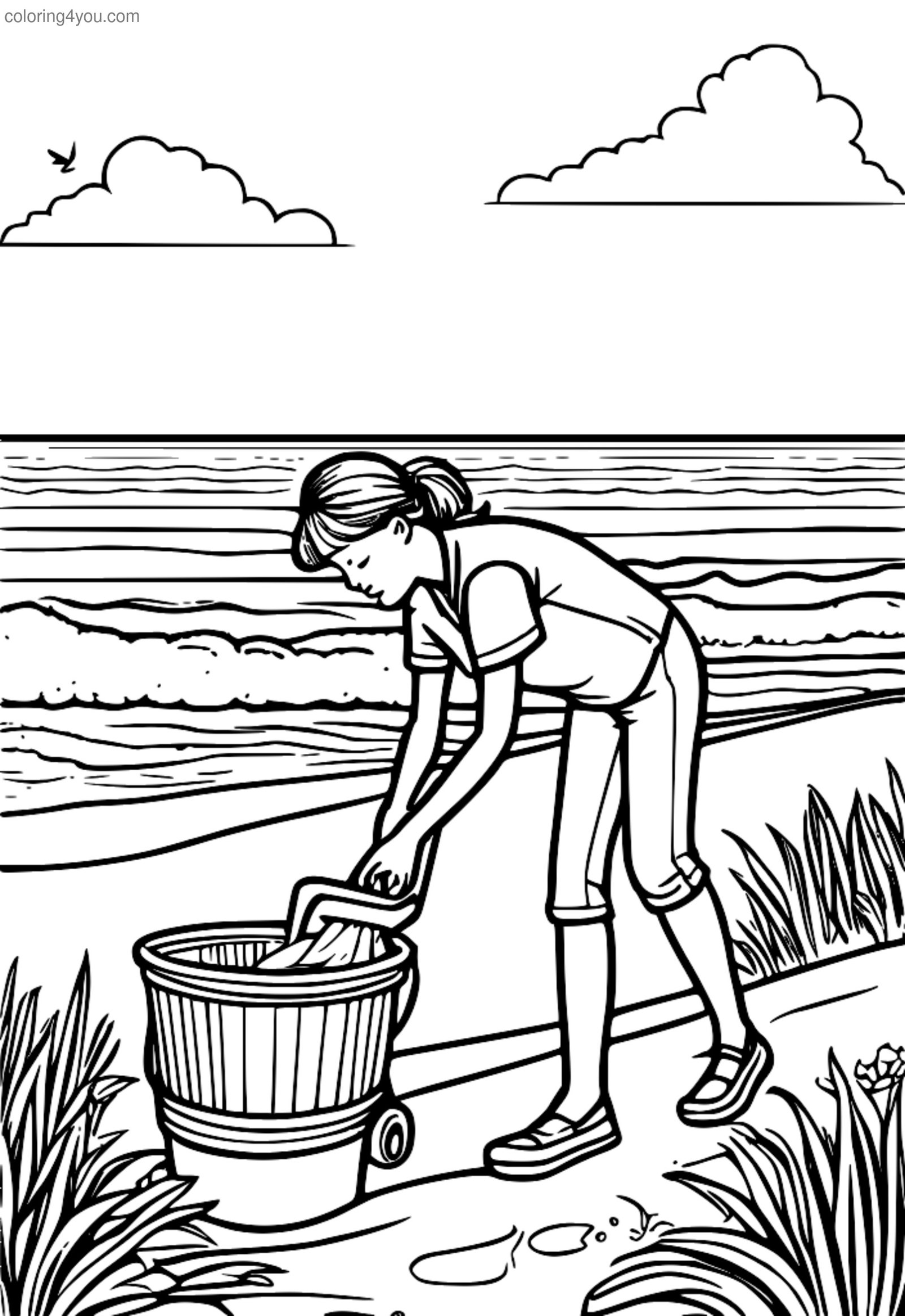 Person, der rydder affald op ved en strandrydningsbegivenhed Person, der rydder affald op ved en strandrydningsbegivenhed